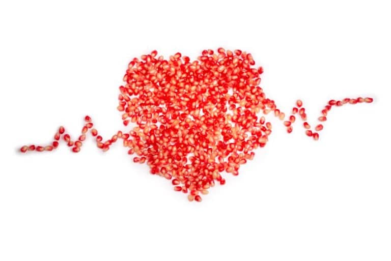mini_pomegranate-red-seeds-isolated-on-white-heart-symbol
